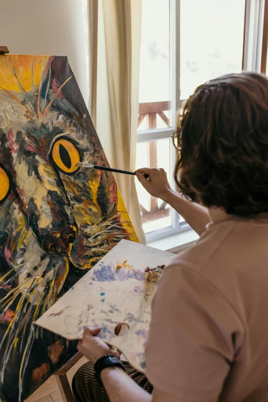 a woman is painting a picture of a cat, pexels contest winner, process art, afremov leonid, frans hals style, on a yellow canva, owl studio