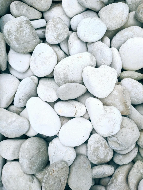 a pile of white rocks sitting on top of each other, an album cover, unsplash, (heart), ✨🕌🌙, healthcare, background image