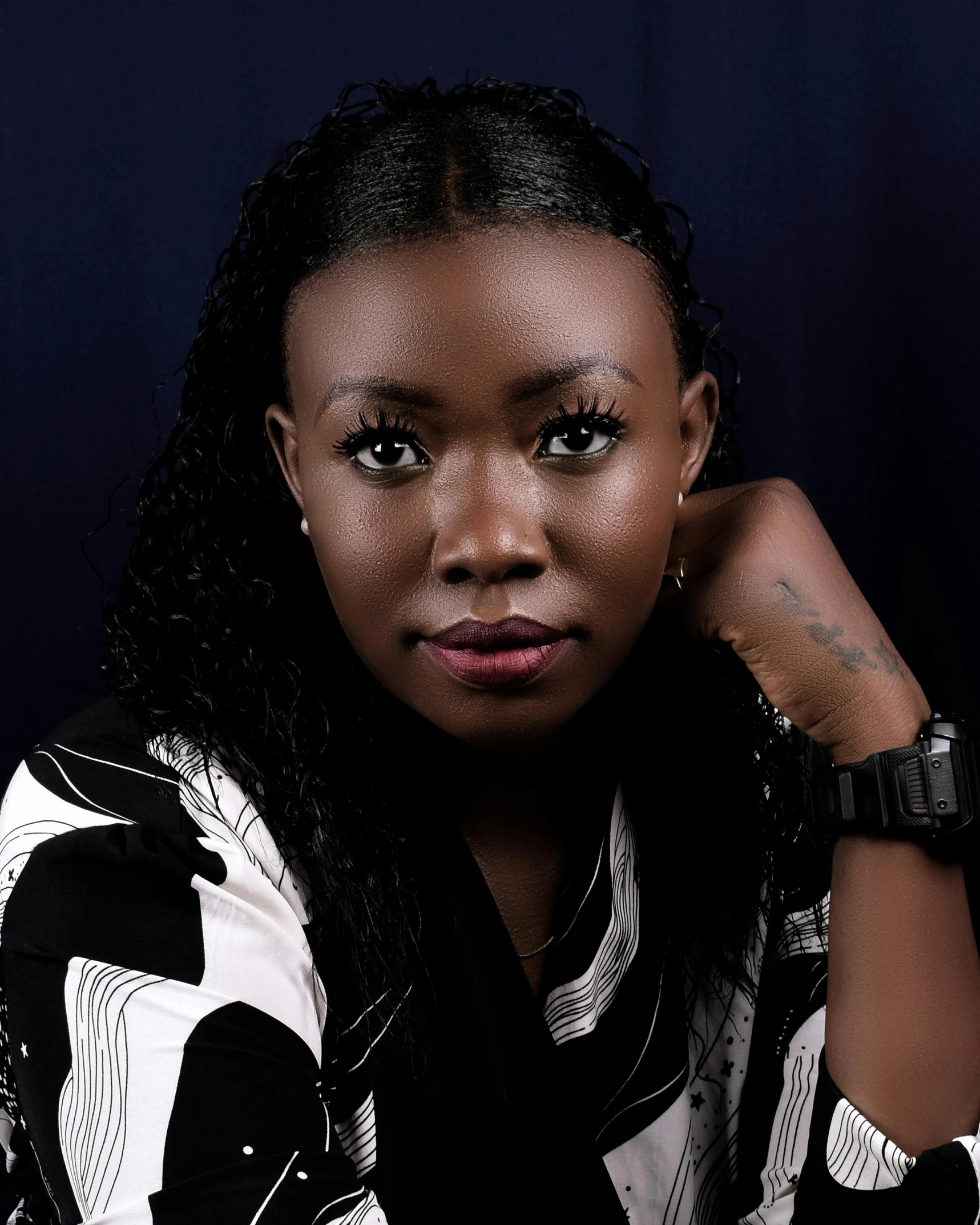 a woman in a black and white shirt posing for a picture, inspired by Chinwe Chukwuogo-Roy, pexels contest winner, ( ( dark skin ) ), prideful look, glossy skin, transparent background