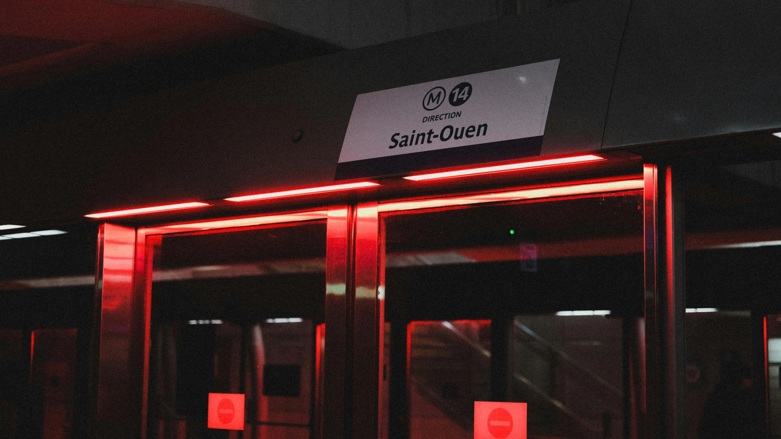 a red light at the entrance of a subway station, unsplash contest winner, quebec, npc with a saint's halo, system unit, 🚿🗝📝