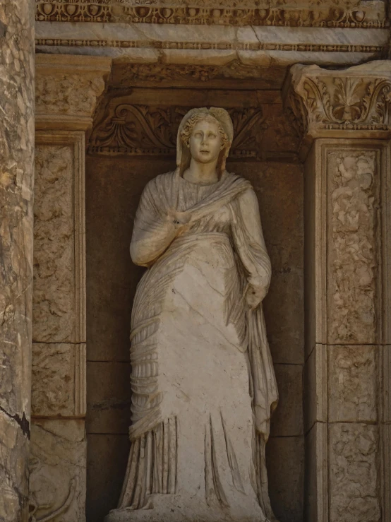 a statue of a woman in a white dress, ancient marble city, serena malyon, full frame image, trending photo