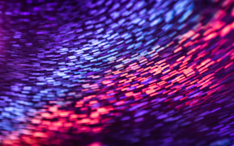 a close up of colorful lights in a dark room, a microscopic photo, by Daniel Lieske, kinetic pointillism, purple and red, binary sunset, magenta and blue, swirling fabric