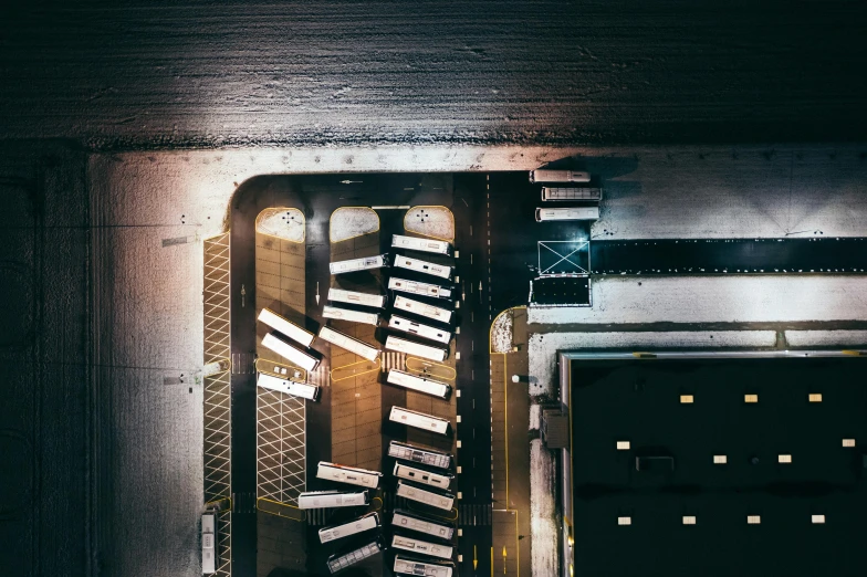 an overhead view of a staircase in a building, by Carey Morris, pexels contest winner, spaceport docking bay at night, buses, stacked, thumbnail