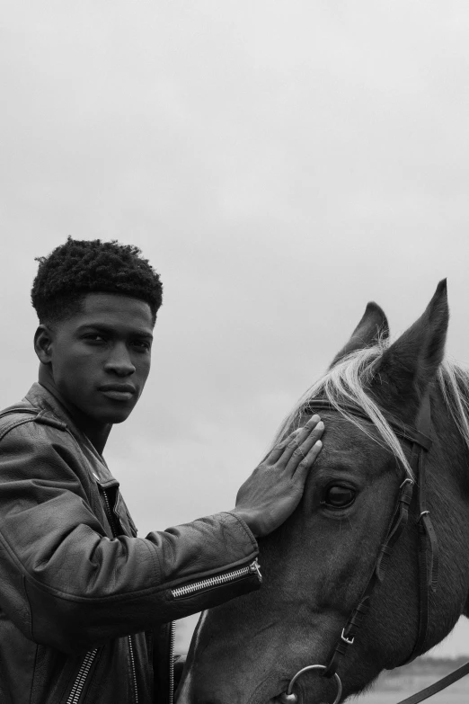 a black and white photo of a man petting a horse, by Alexis Grimou, realism, handsome hip hop young black man, distant - mid - shot, young prince, with afro