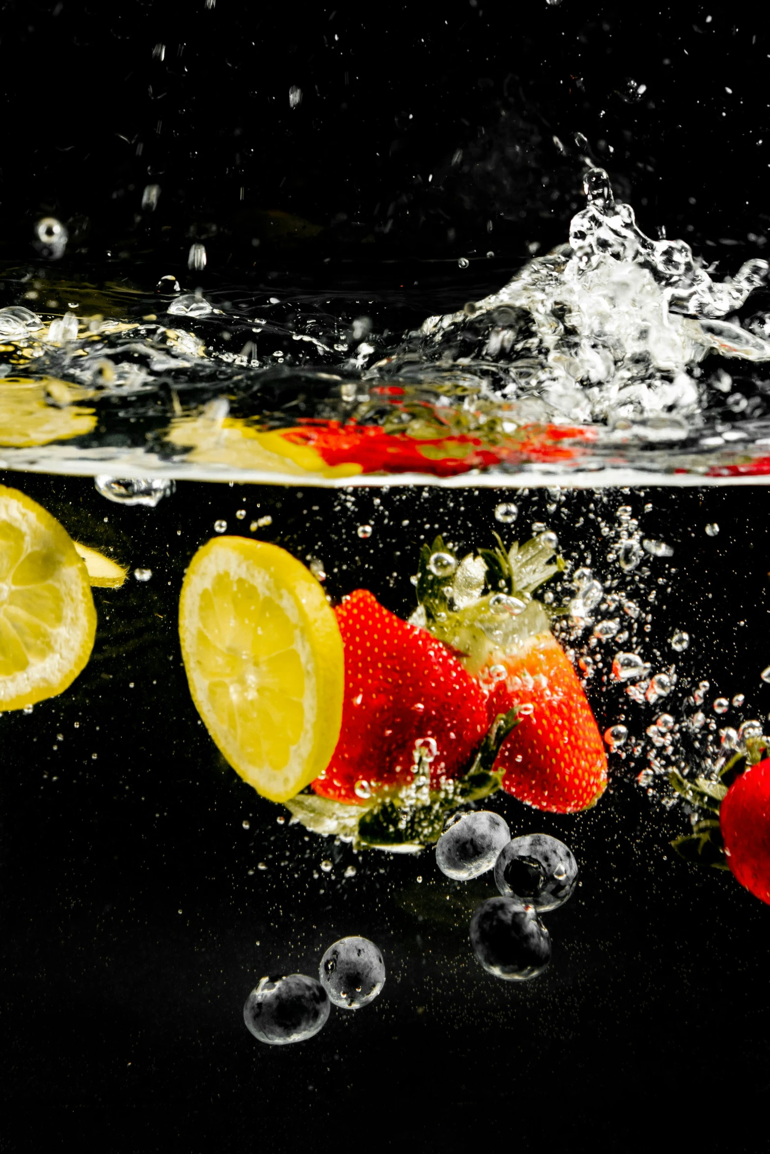 strawberries and lemons are falling into the water, by Paul Emmert, pexels, process art, slide show, profile, cold drinks, museum quality photo