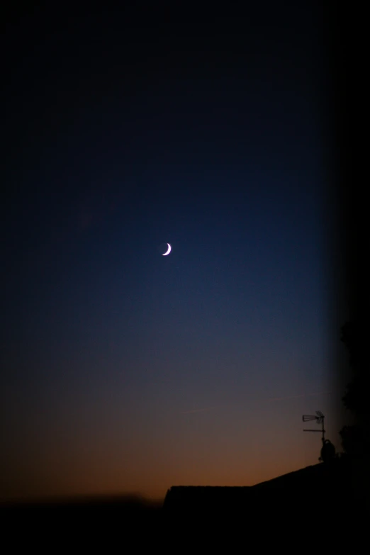 the moon is seen through the window of a house, a picture, by Attila Meszlenyi, unsplash, hurufiyya, break of dawn on venus, silhouette!!!, crescent moon, pastel sky