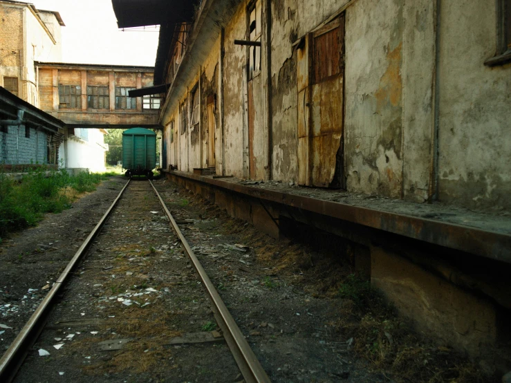 the train tracks have just crossed into one side