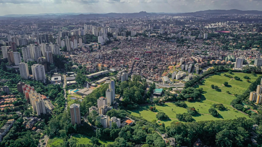 a view of a city from a bird's eye view, by Luis Miranda, pexels contest winner, helio oiticica, lush surroundings, bolsonaro, a park