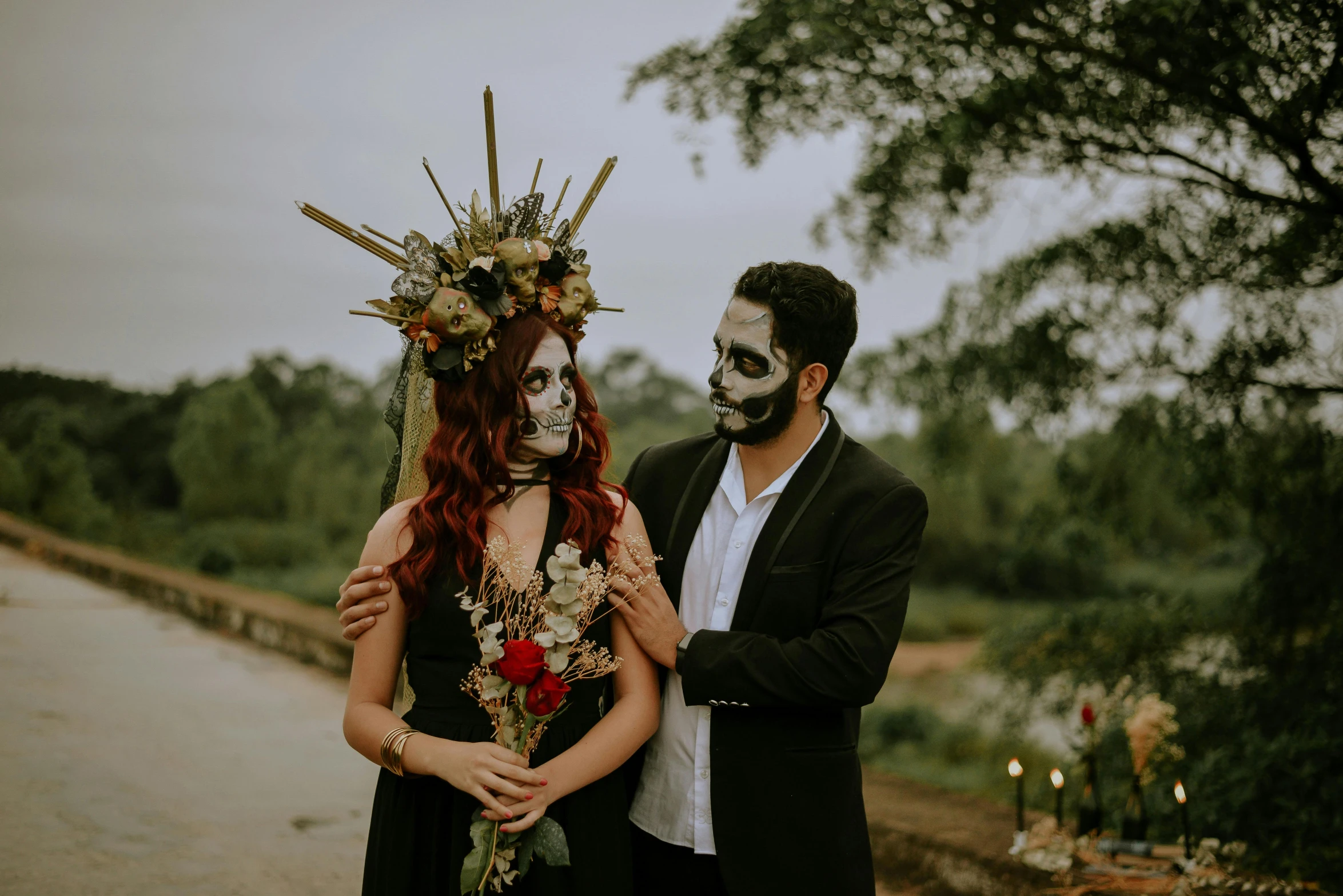 a man and a woman standing next to each other, pexels contest winner, international gothic, skull bones flowers, avatar image, headpiece, bouquet