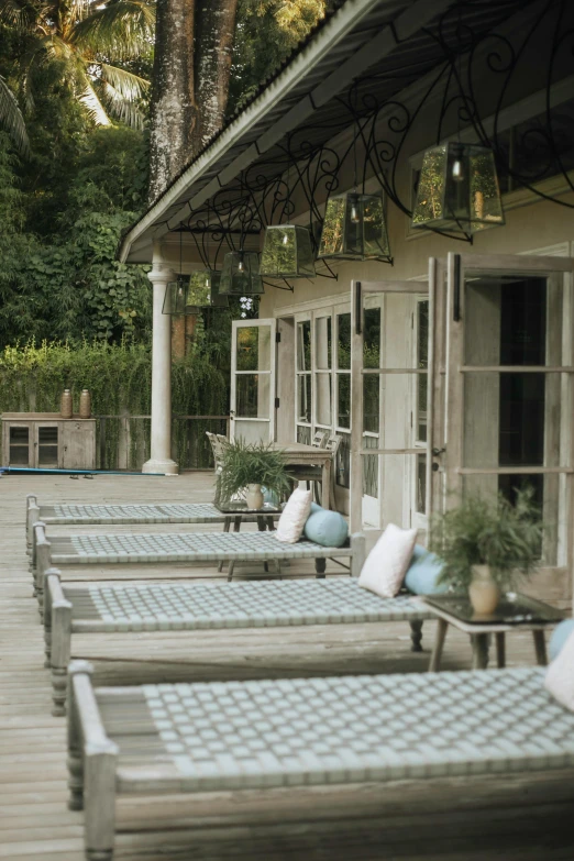 a patio with several patio furniture outside