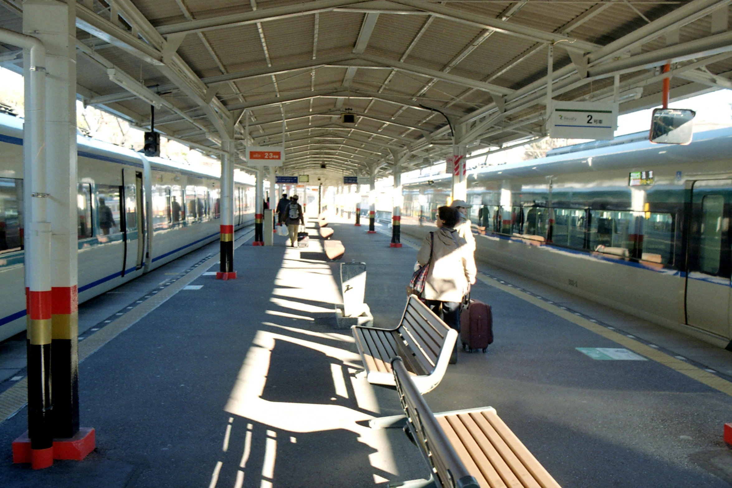 a subway train on the tracks is waiting for passengers