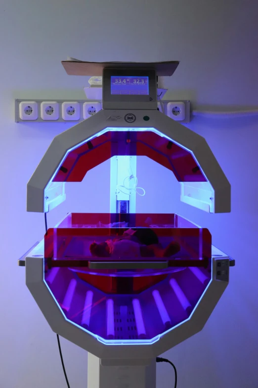 a close up of a machine in a room, featured on reddit, holography, glowing mri x-ray, red leds, high tech space ship interior, bioart