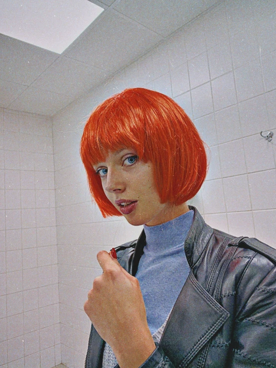 a woman with red hair brushing her teeth in a bathroom, an album cover, inspired by Cindy Sherman, trending on reddit, rei ayanami, low quality photo, madison beer as leeloo, chrome bob haircut