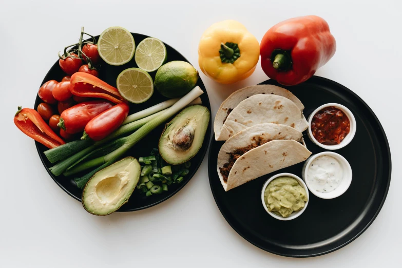 a plate of food sitting on top of a table, veggies, tacos, high quality product image”, fan favorite