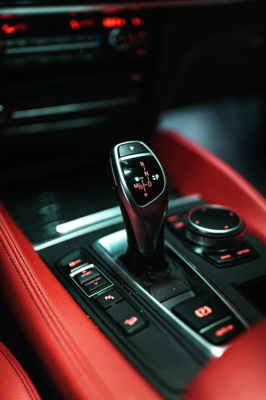 a red interior has a manual panel and red dash panel