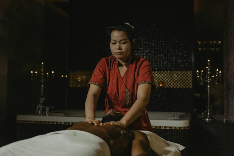 a woman getting a massage at a spa, a portrait, pexels contest winner, hurufiyya, thumbnail, cinematic full shot, asian male, black