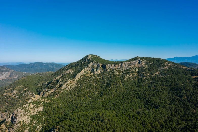 the view of some hills from a high up in the sky