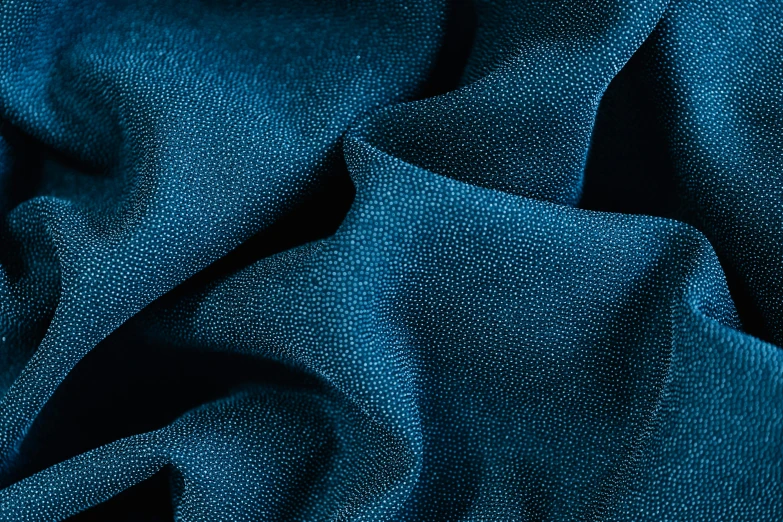 the dark blue fabric has been made to look like it is fabric