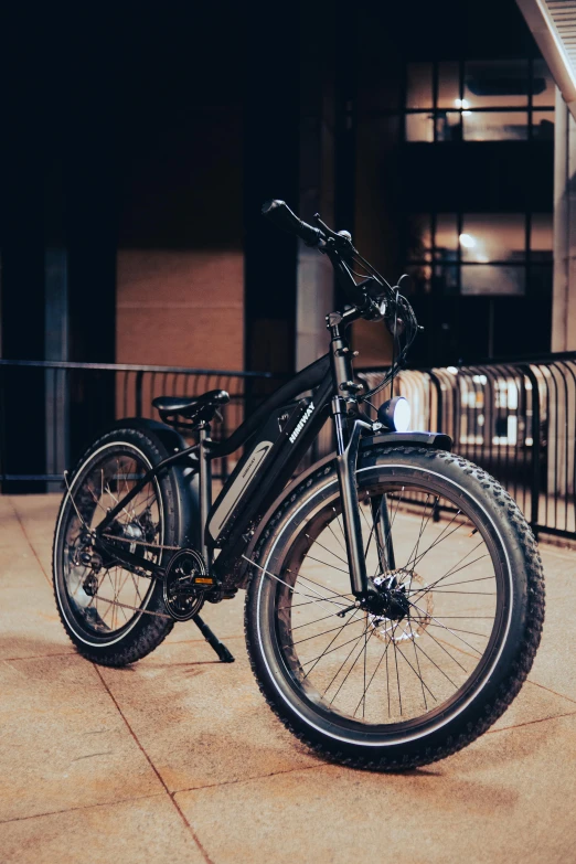 a bicycle parked in front of a building, on a dark background, profile image, super model-s 100, rugged details