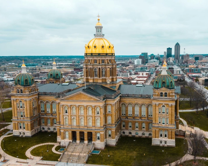 a large building with a dome on top of it, by Kristin Nelson, pexels contest winner, iowa, beautiful gold saint, drone footage, 2 5 6 x 2 5 6 pixels