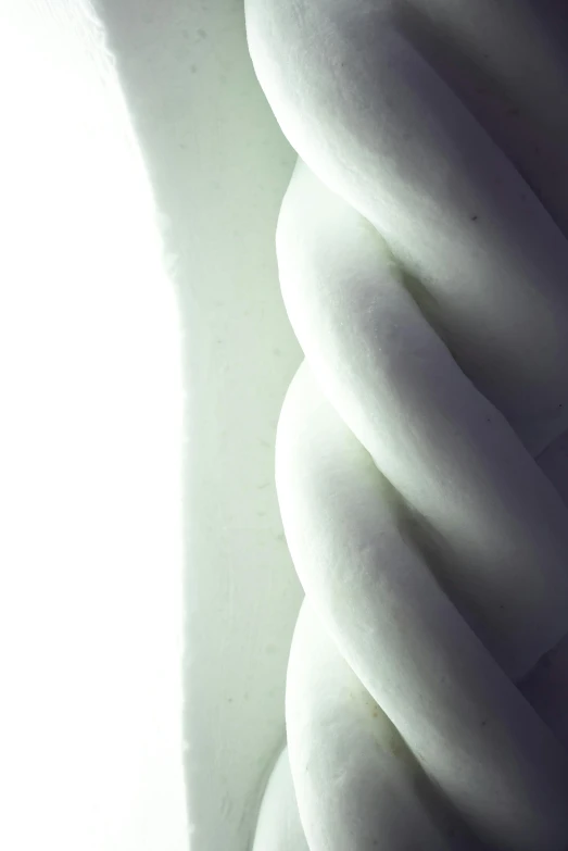 a close up of a light bulb on a window sill, a marble sculpture, by Doug Ohlson, unsplash, arabesque, loose white braid, white neon wash, extreme close up shot, large chain