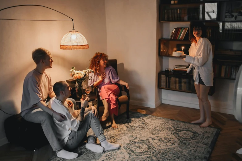 a group of people sitting in a living room, pexels contest winner, renaissance, comfy lighting, wearing simple robes, teenager hangout spot, profile image