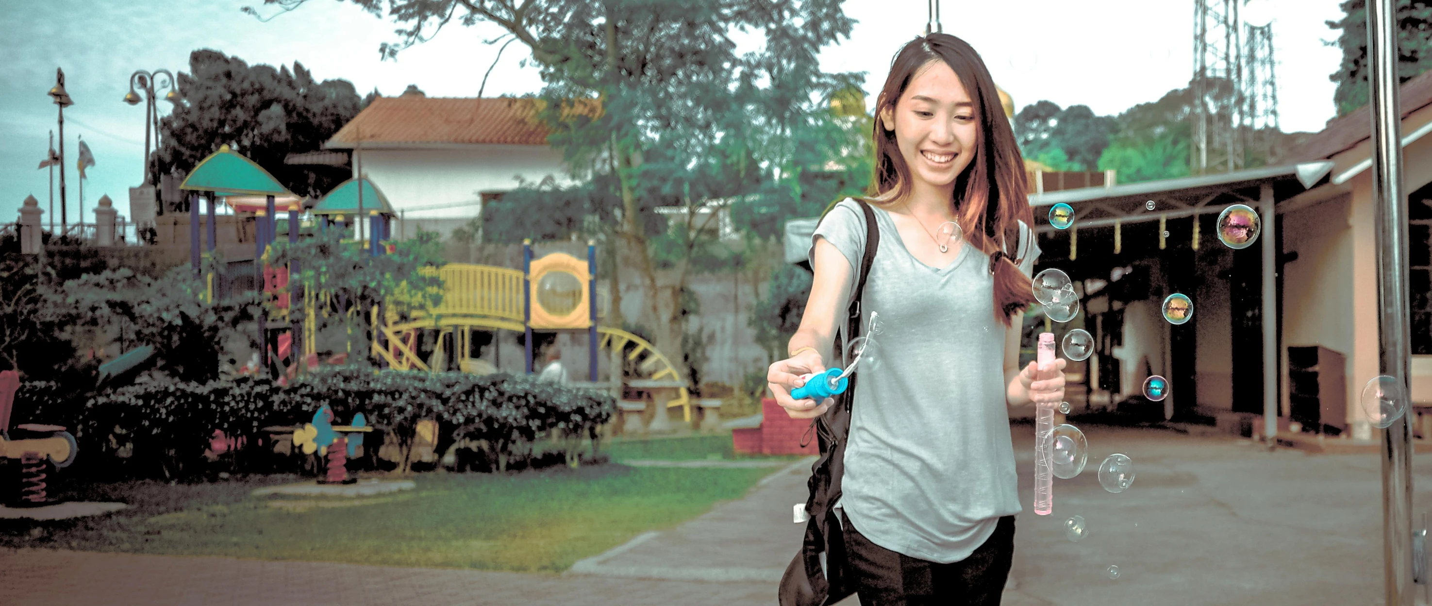 a woman walking down a sidewalk holding a bottle of water, a portrait, pexels contest winner, set on singaporean aesthetic, at college, holding a yellow toothbrush, panoramic view of girl