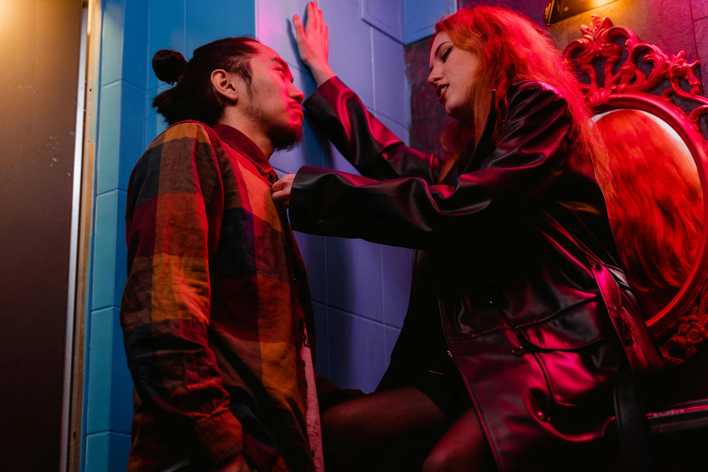 a man and a woman standing next to each other, inspired by Nan Goldin, pexels, antipodeans, colorful scene, kimetsu no yaiba, tickle fight in the death tent, in an elevator