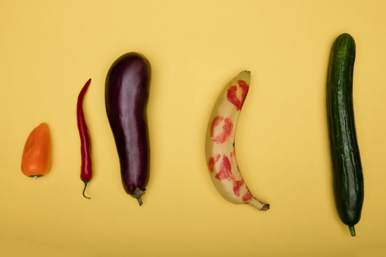 a banana, eggplant, and pepper on a yellow background, by Julia Pishtar, trending on pexels, sensual bodies, purple and red, on grey background, speculative evolution
