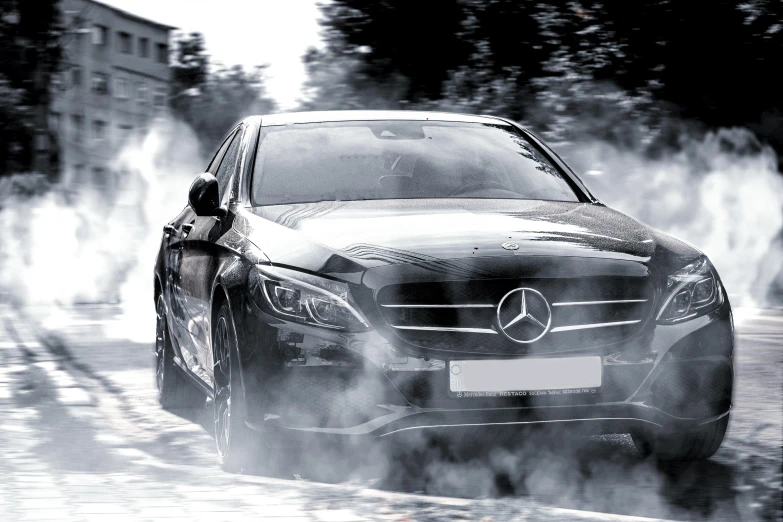 a black and white photo of a car with smoke coming out of it, pexels contest winner, mercedes, octane engine render 8k hdr, wet asphalt, full dynamic colour