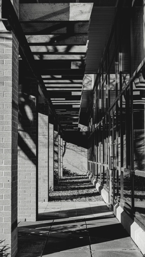 long walkway that runs through an outside building