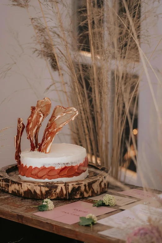 a cake sitting on top of a wooden table, inspired by Tomàs Barceló, bacon, forest themed, rituals, salami