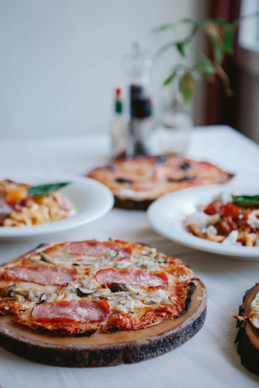 the pizzas are ready for consumption at the restaurant