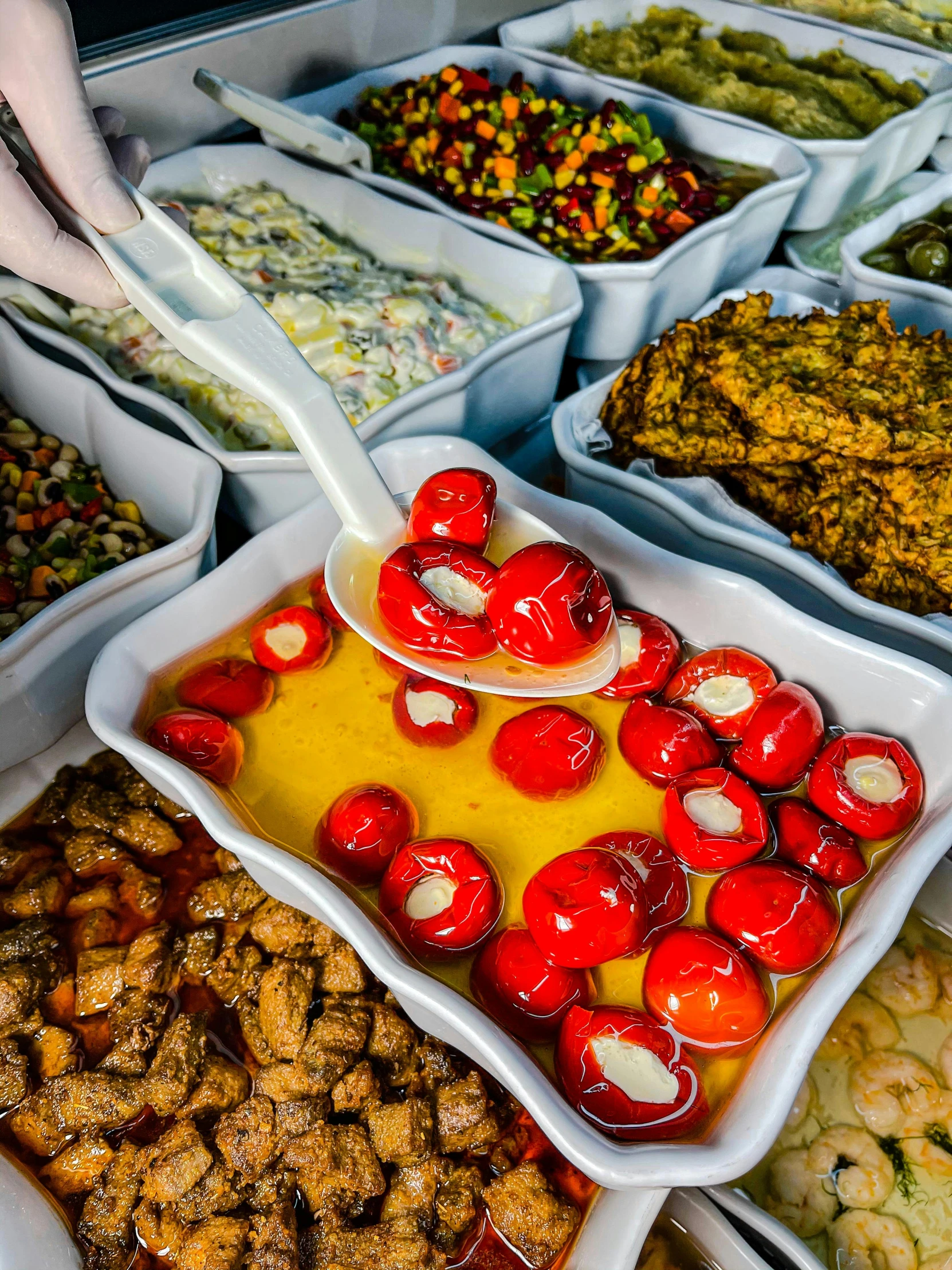 a table filled with lots of different types of food, a photo, by Daniel Lieske, pexels, some red and yellow, ethiopian, instagram story, close-up photo