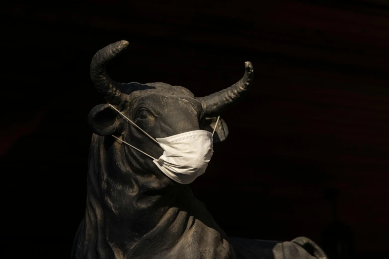 a statue of a bull wearing a face mask, by Karel Dujardin, pexels contest winner, hyperrealism, medical mask, pbr material, atmospheric photo, in spain