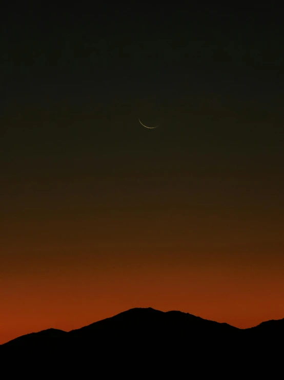 a crescent in the sky with mountains in the background, by Kristian Zahrtmann, hurufiyya, orange, 7