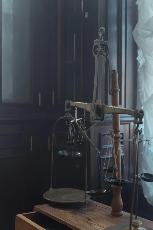 a scale and some glass vases in a room