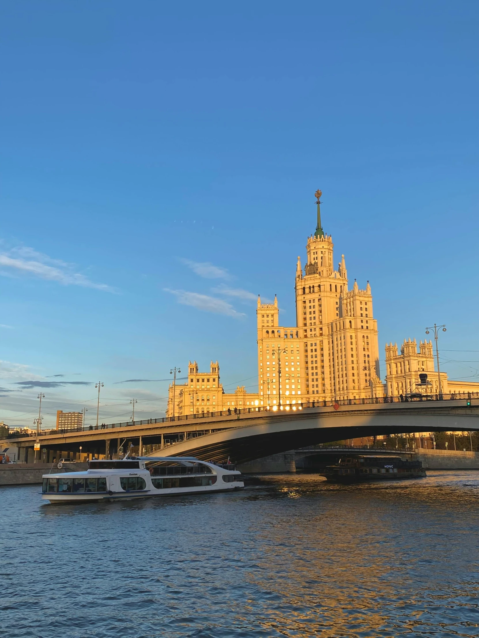 a bridge over a body of water with a building in the background, inspired by Vasily Vereshchagin, pexels contest winner, socialist realism, on a boat, 15081959 21121991 01012000 4k, panorama view, gta in moscow