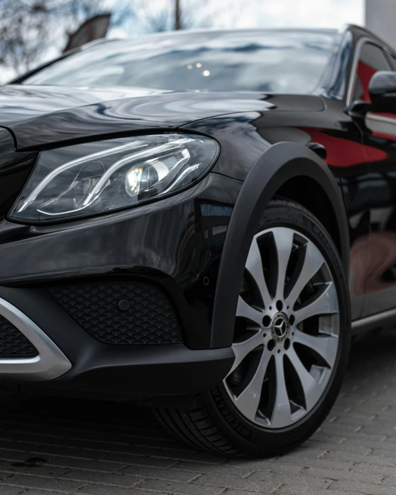 a black car parked on the side of the road, 2 0 % pearlescent detailing, close up details, square, side lighting xf iq4