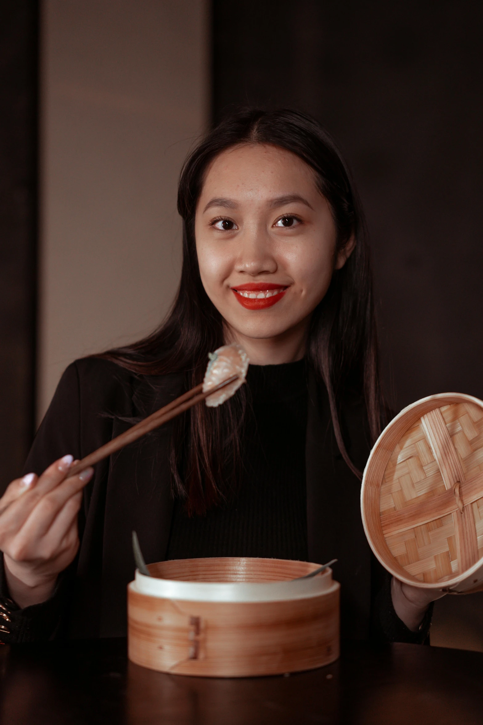 a woman holding chopsticks over a bowl of food, an album cover, inspired by Qian Du, lacquerware, wearing professional makeup, profile image, instagram photo