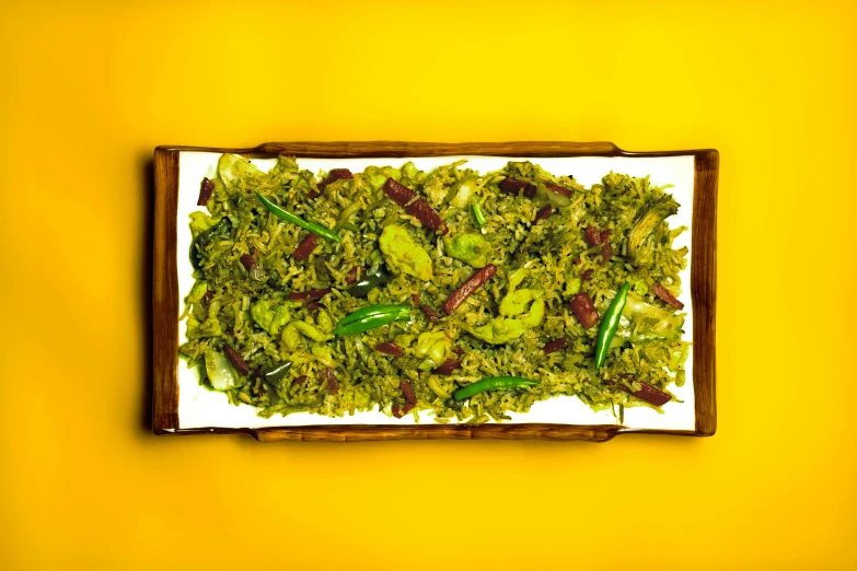 a close up of a plate of food on a table, it\'s name is greeny, malayalis attacking, dried herbs, salad