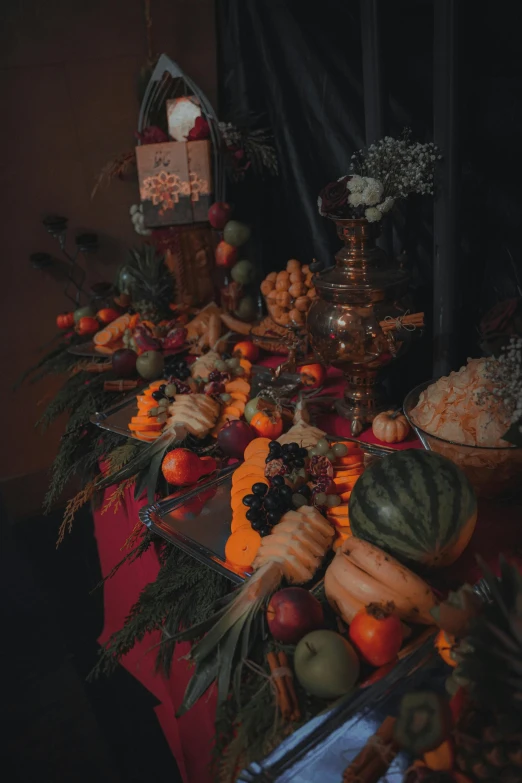 a table topped with lots of different types of food, a still life, unsplash, renaissance, carriage made of pumpkins, full body image, dark, sentient fruit