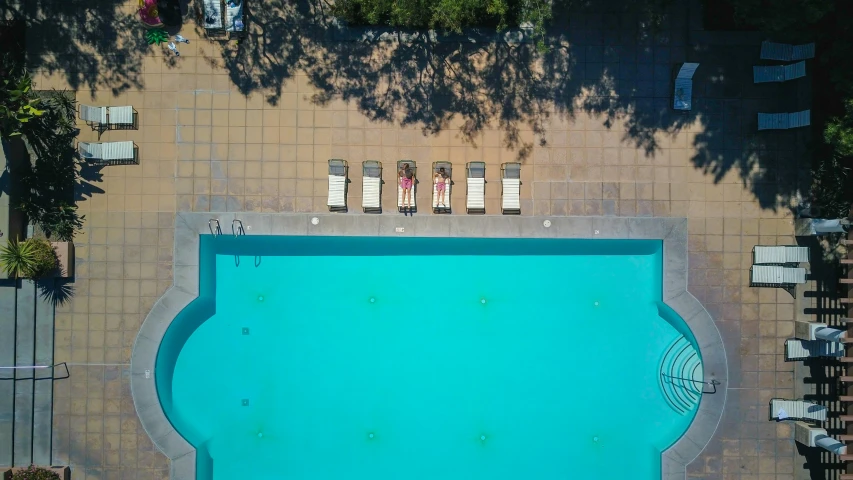 aerial view of swimming pool in urban area