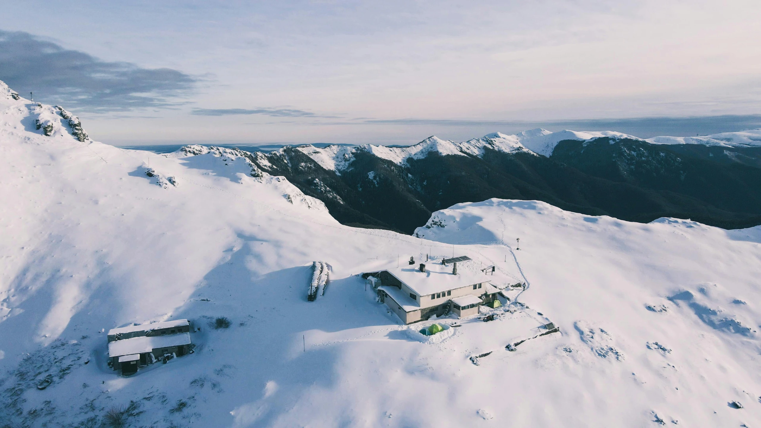 a group of people standing on top of a snow covered mountain, cafe in the clouds, flatlay, kahikatea, profile image