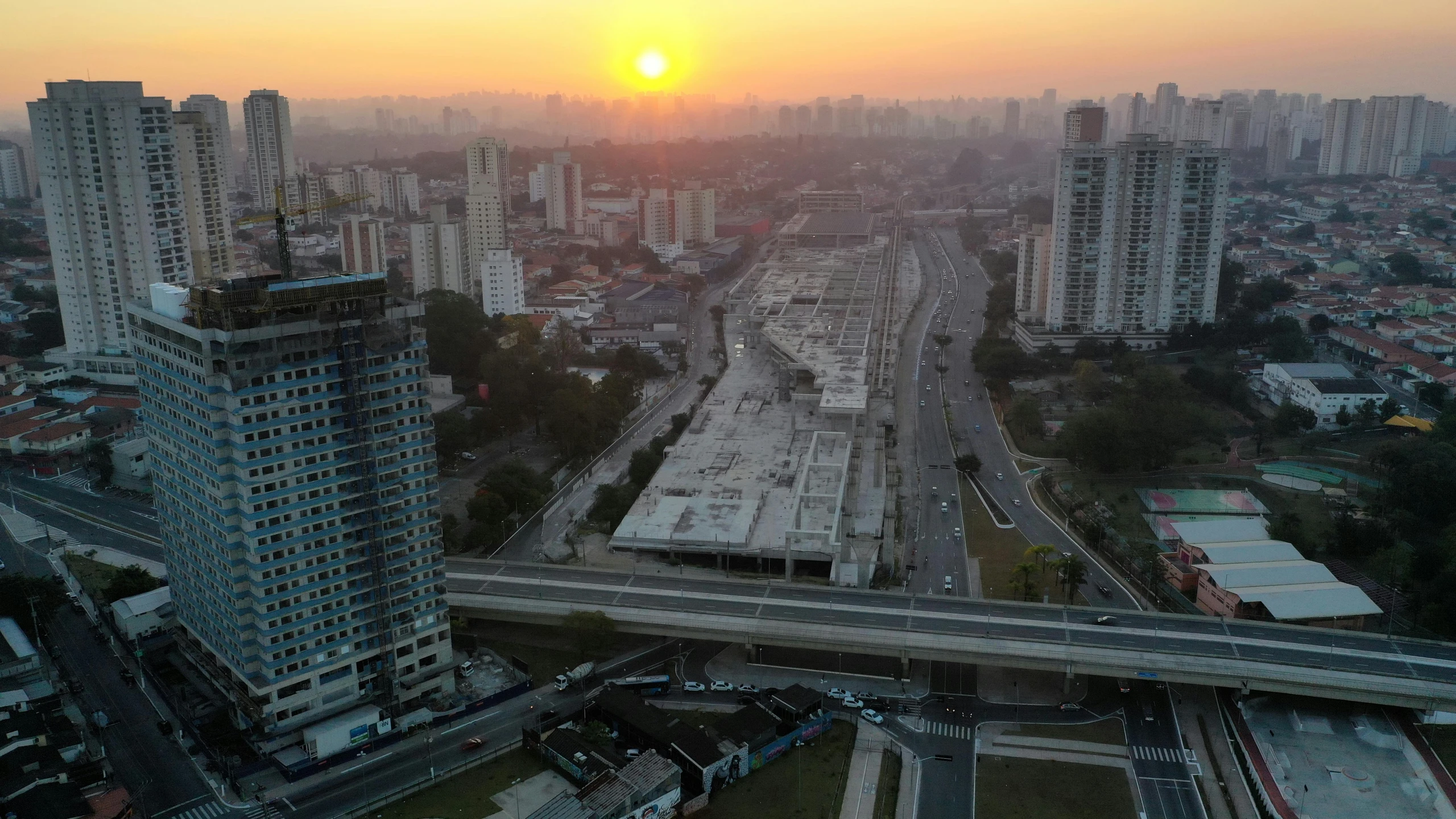 an aerial view of a city at sunset, by Alejandro Obregón, happening, são paulo, documentary still, lut, malika favre