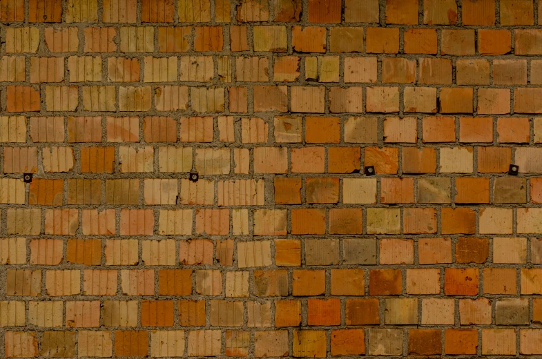 a close up of a wall with various colors