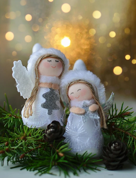 a couple of angels sitting on top of a christmas tree, dwarf with white hair, sofya emelenko, felt, white and silver