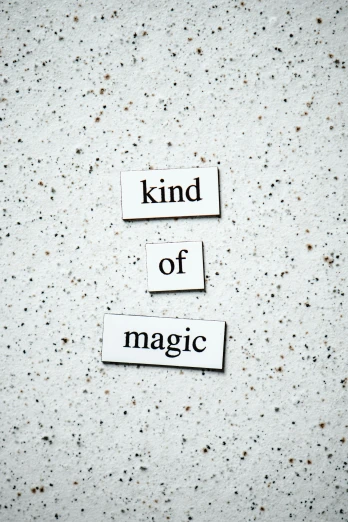 a piece of paper with the words kind of magic written on it, by Niko Henrichon, trending on unsplash, magic realism, concrete poetry, magic spell icon, magnetic, canvas print