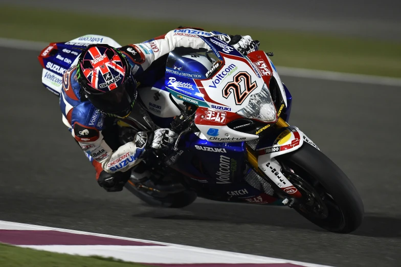 a person riding a motorcycle on a race track, dubai, avatar image