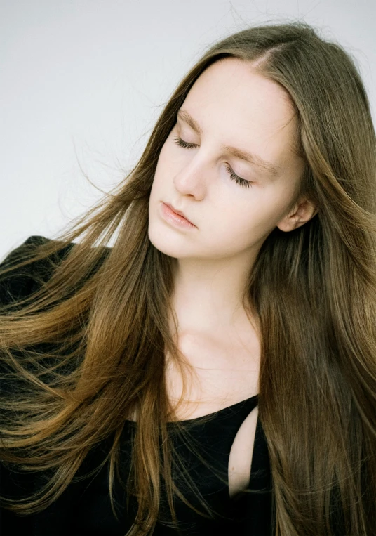 a close up of a person with long hair, an album cover, inspired by Anna Füssli, light brown neat hair, studio photo portrait, long ashy hair | gentle lighting, classical